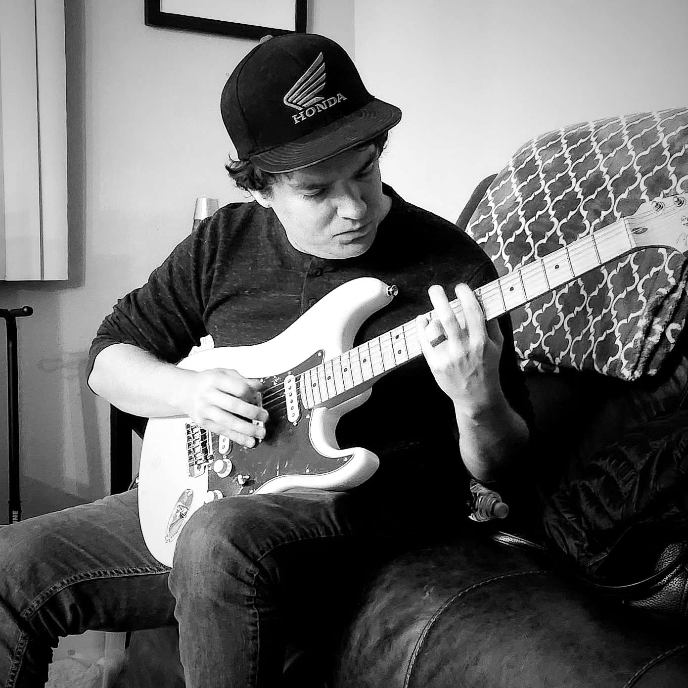 Johnny smiling in black and white